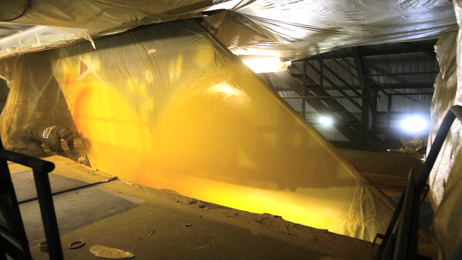 The Sunny Heart logo being sprayed