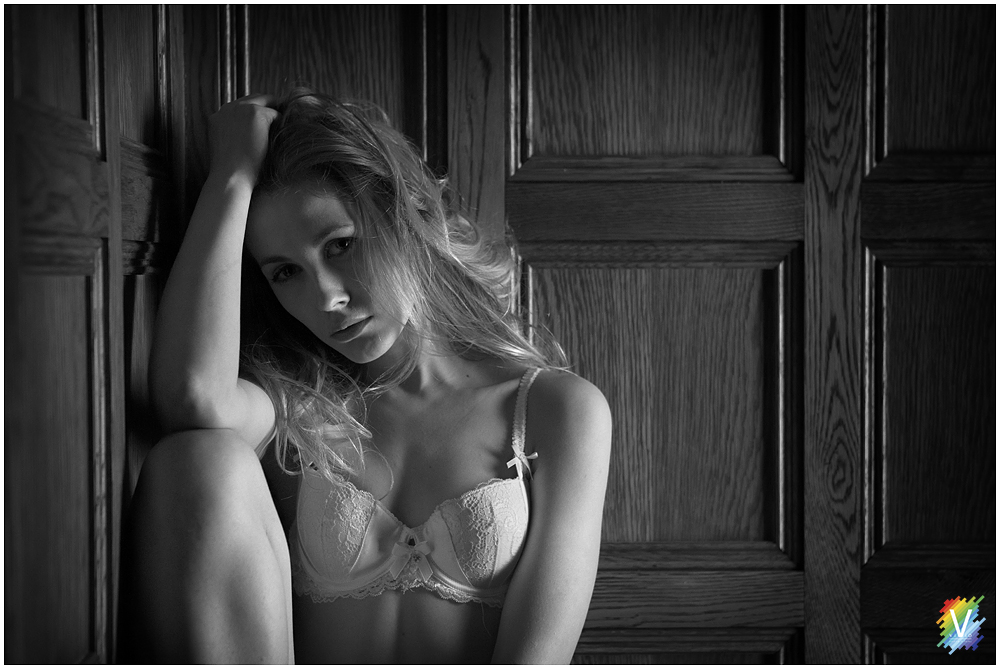 Model posing in Wood panelled Room